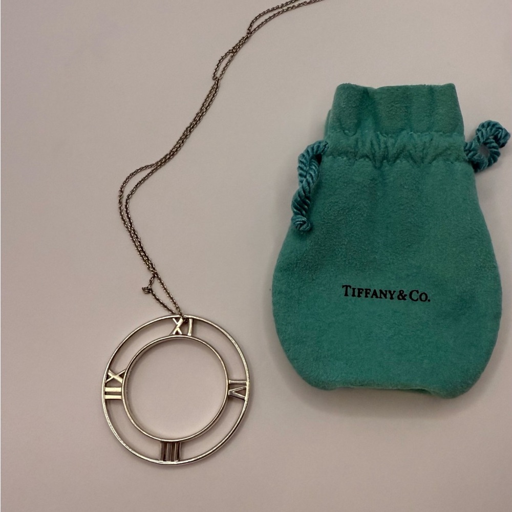 Tiffany & Co. Silver Roman Circle Pendant
